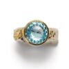 Handmade-Ring-XXL-blue-topaz-set-in-gold, ring-silver-with-gold-curls